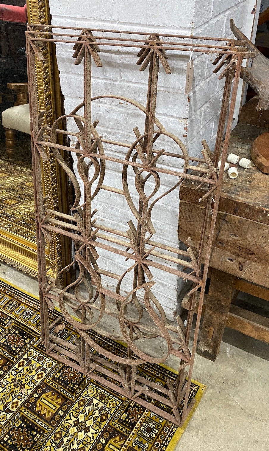 Three rectangular wrought iron panels, width 60cm, height 116cm
